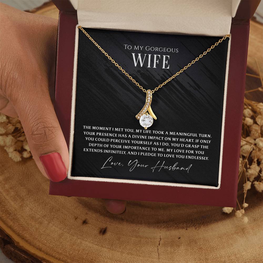Celebrate your forever love with this gorgeous necklace for your wife. “Whispers of Forever” is a touching expression of love that speaks to the heart.