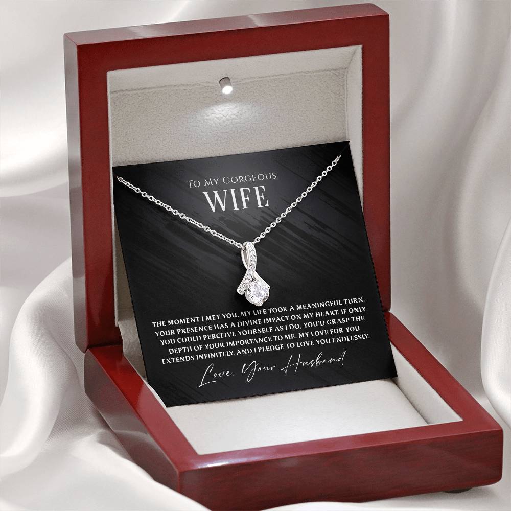 Whispers of Forever Necklace – a meaningful gift for your beautiful wife. A perfect way to show how much she means to you and that your love will never fade.

