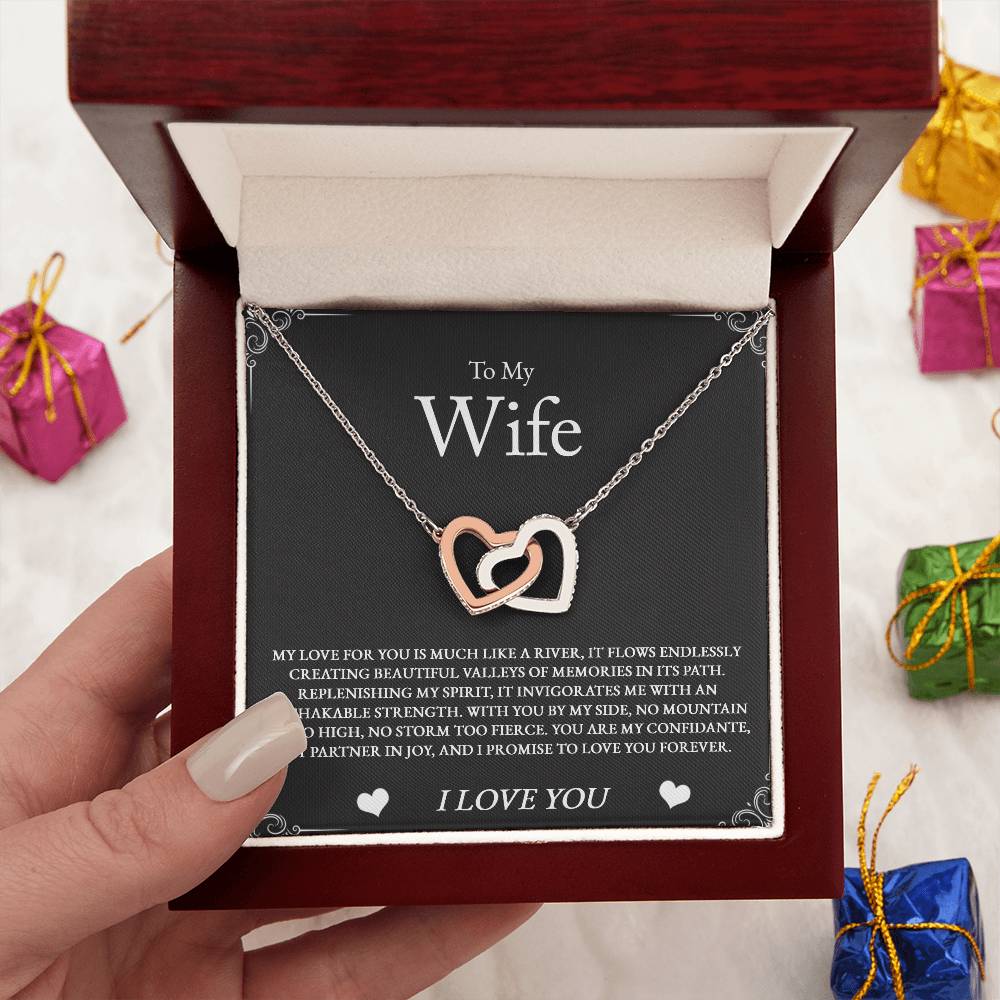 Romantic gift for your special someone – this elegant Hearts Necklace symbolizes the steady, powerful current of your shared love. The “River of Love” message says it all.

