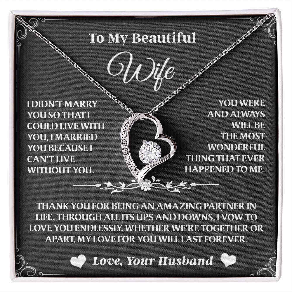 Dazzling necklace with heart charm—perfect way to say “I love you” to your wife.
