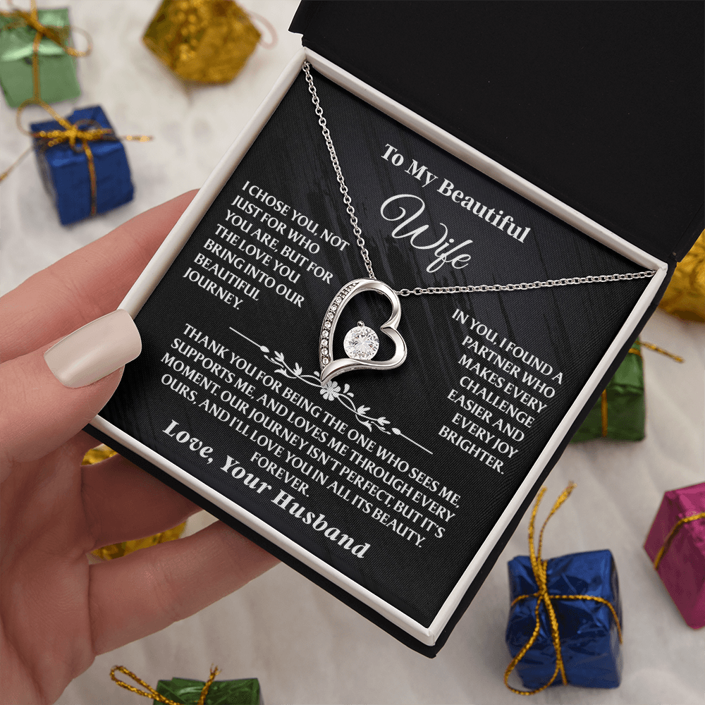Romantic jewelry gift for wife, showcasing a timeless heart pendant and loving message.