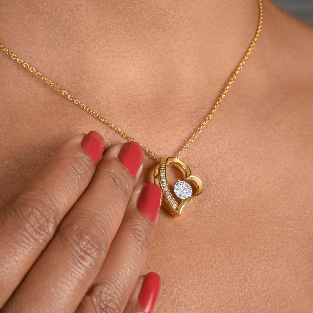 To My Wife – Forever Love Necklace Gift Set worn on neck, showcasing gold heart pendant with crystal center, a romantic jewelry gift for her.